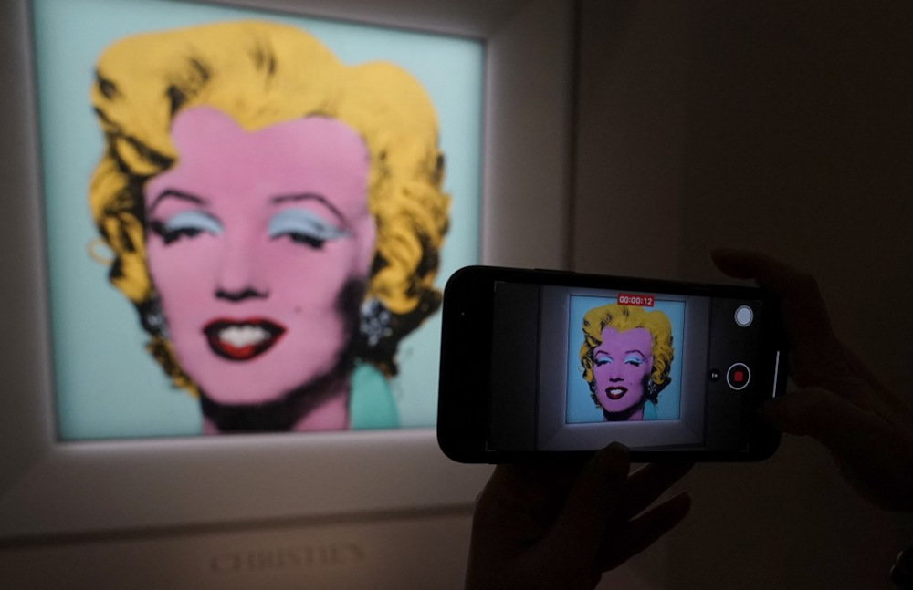 Warhol's famed 'Marilyn' silk-screen sells for record US$195m at auction