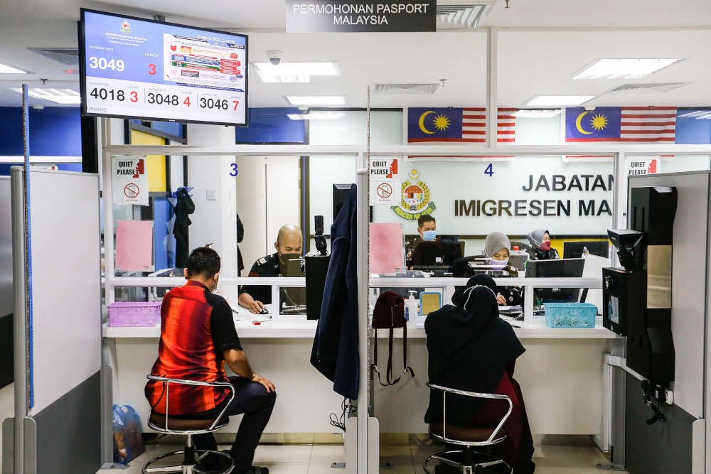 Report: Immigration Dept extends office hours as border reopening drives passport demand