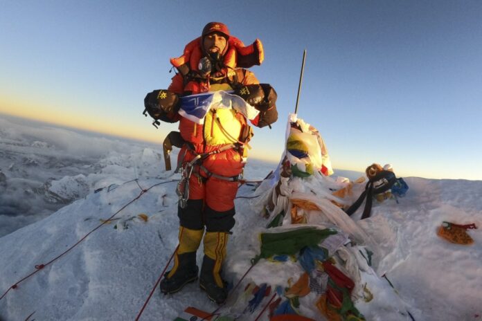 Indian climber banned for faking Everest ascent reaches summit