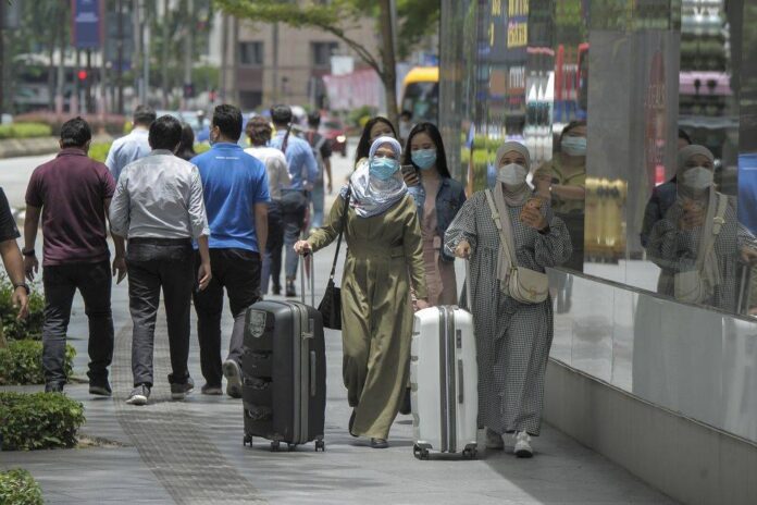 Experts: Discrimination among reasons why Malaysian women seeking fortunes abroad, opt against return