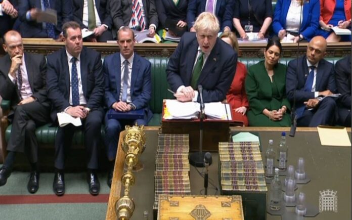 UK's PM 'in denial' as he faces MPs after confidence vote