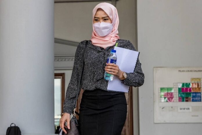 1MDB trial: AmBank officer verifies documents showing RM45m entered Najib's account in 2014