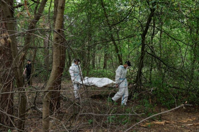 Police: Seven bodies found in grave near Bucha