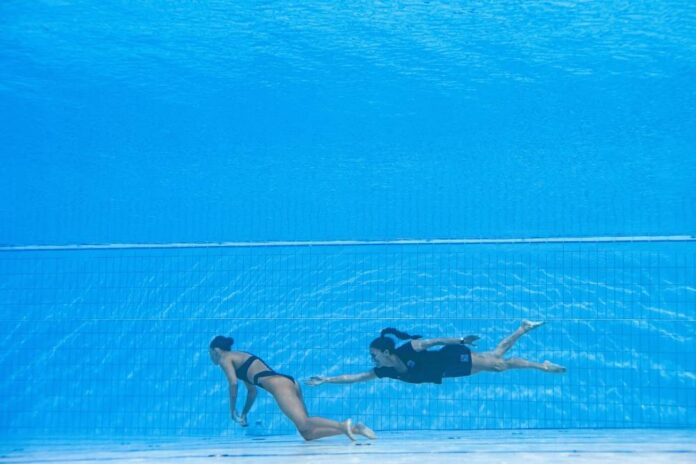 US artistic swimmer Alvarez, who fainted in solo event, forced out of team competition