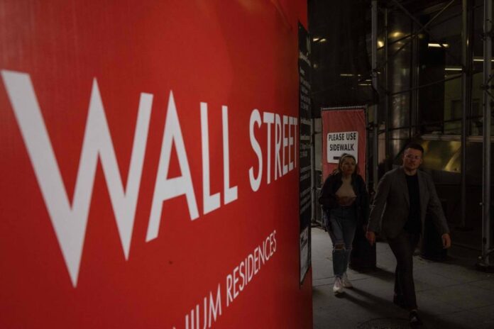 Wall Street set for subdued open as Fed hawks push for faster rate hikes