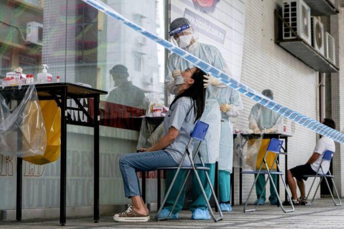 Macau Covid infections rise as spread extends to medics, police