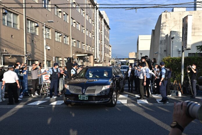 Japan mourns as body of assassinated PM Abe returns to Tokyo
