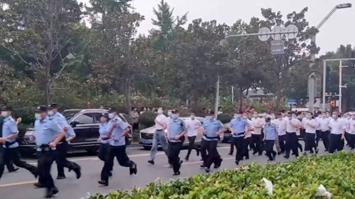 Chinese provincial authorities promise payments after bank protests