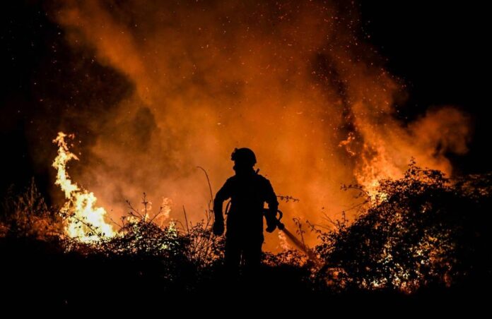 Wildfires blaze across sweltering southwest Europe