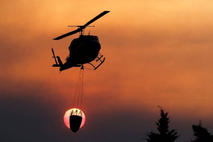 Wildfires rage in France and Spain as heatwaves sweep Europe