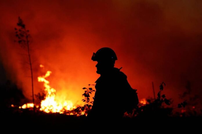 Forest fires rage in scorching southwest Europe