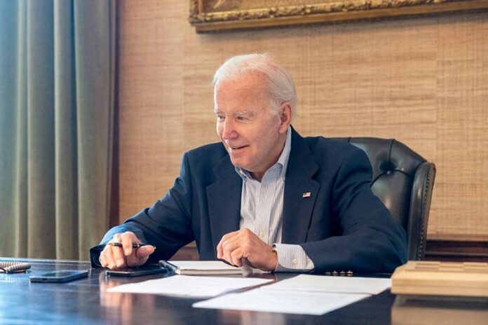 Biden says he is 'doing well,' working after testing positive for Covid-19