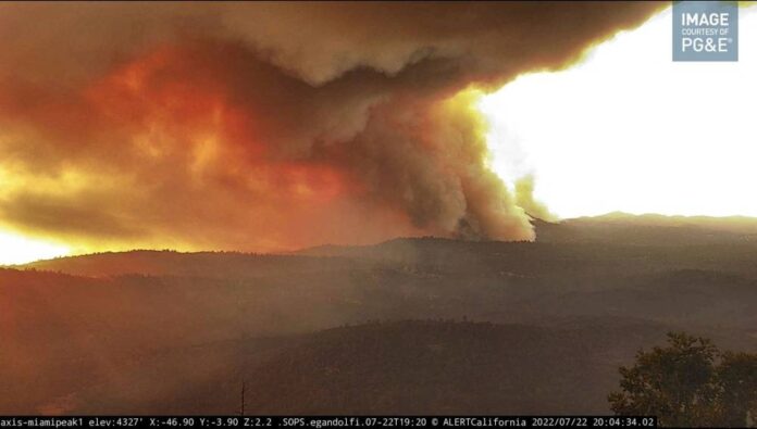 California wildfire rages as US bakes in record-setting heat wave