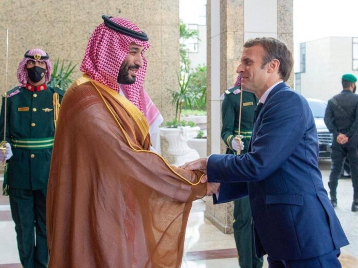 Macron hosts Saudi crown prince with oil, Iran, rights on agenda