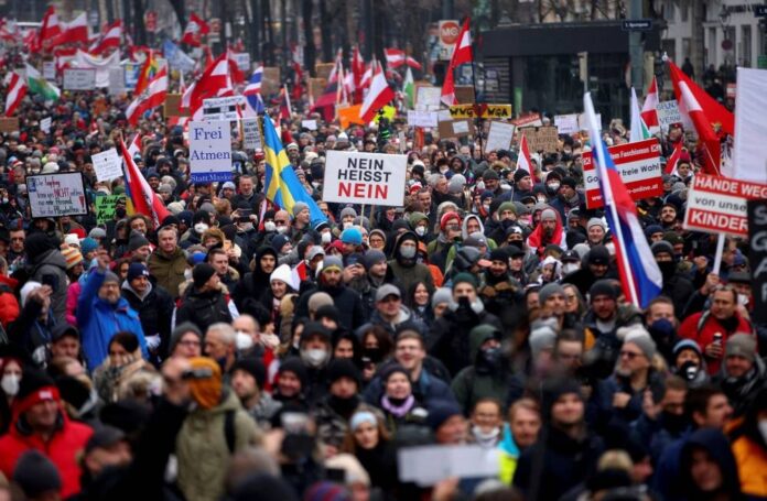 Austria mourns suicide of doctor targeted by anti-vaccine campaigners