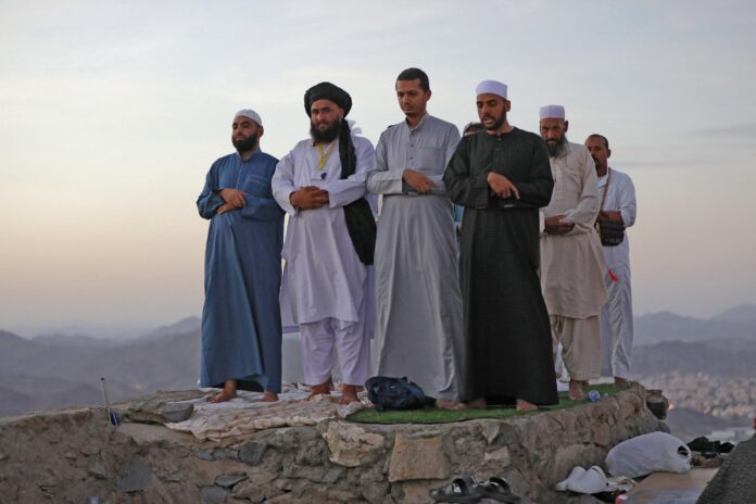 Pilgrims scale Mount Arafat for climax of biggest Covid-era hajj
