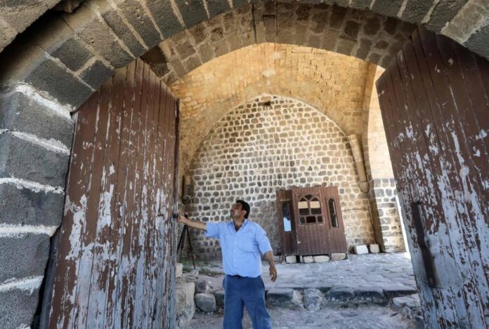 With few visitors, custodian of Syria castle has lonely job