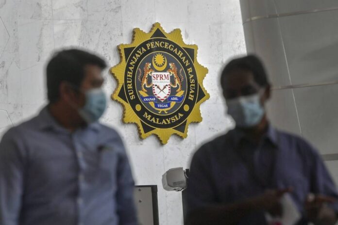 Johor anti-graft officers nab couple for false claims involving school transportation