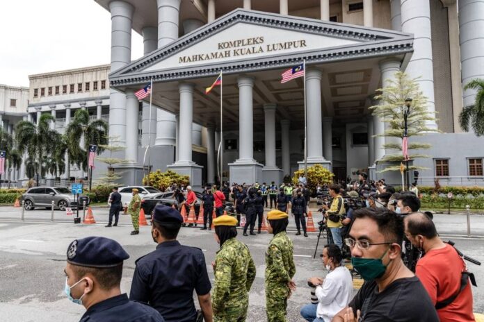 DAP accuses Umno leaders and Najib loyalists of trying to subvert judicial institution