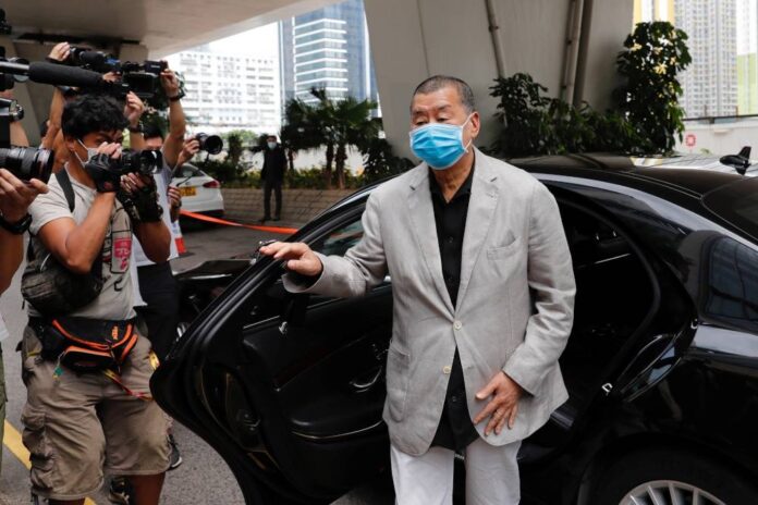 Hong Kong court orders search of media tycoon Jimmy Lai's phones