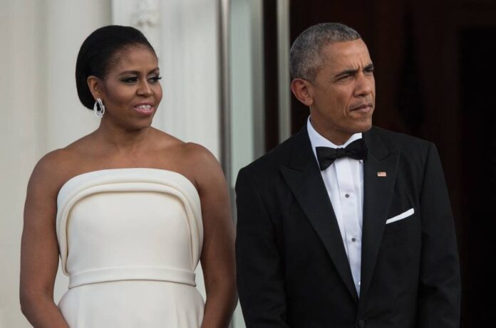 Obamas to unveil White House portraits after Trump snub