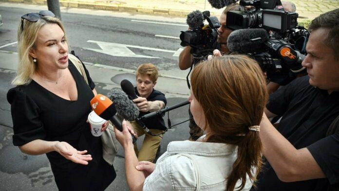 Russian TV protester ordered to pay new fine over Ukraine