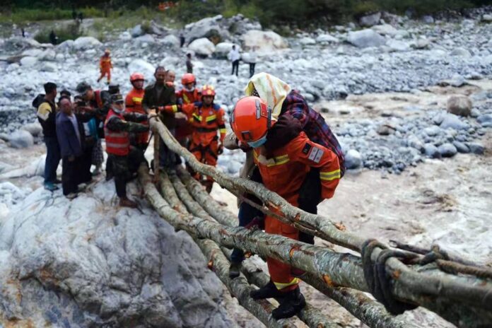 Rescuers scour for survivors after dozens killed in China quake