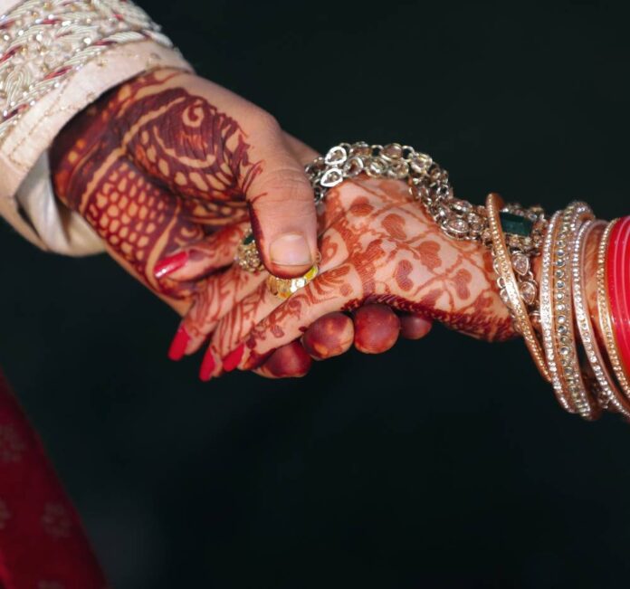 In India, groom flees big day after first wife, cops crash wedding reception