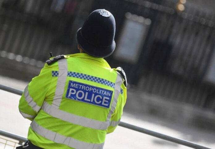 UK police say two officers stabbed in central London