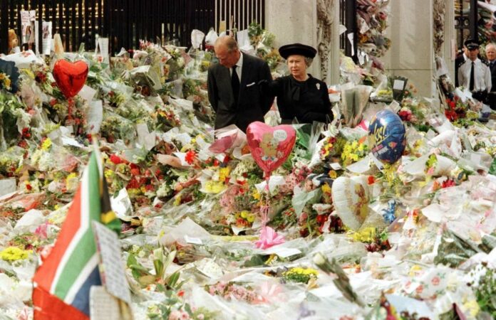 Stung by criticism over Diana, Britain's royals show common touch
