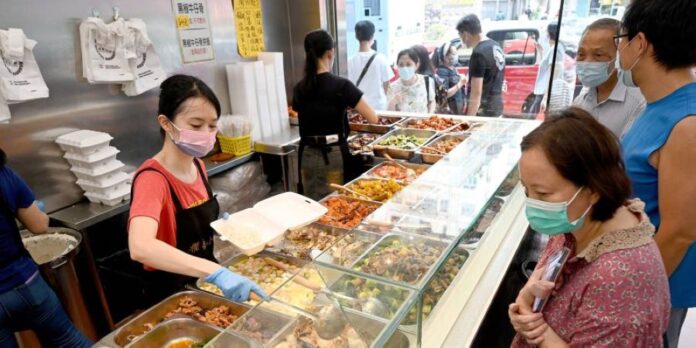 Cheap mealboxes a taste of Hong Kong's economic woes