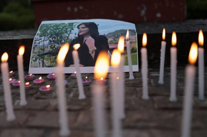 Iran security forces clash with protesters over Amini's death