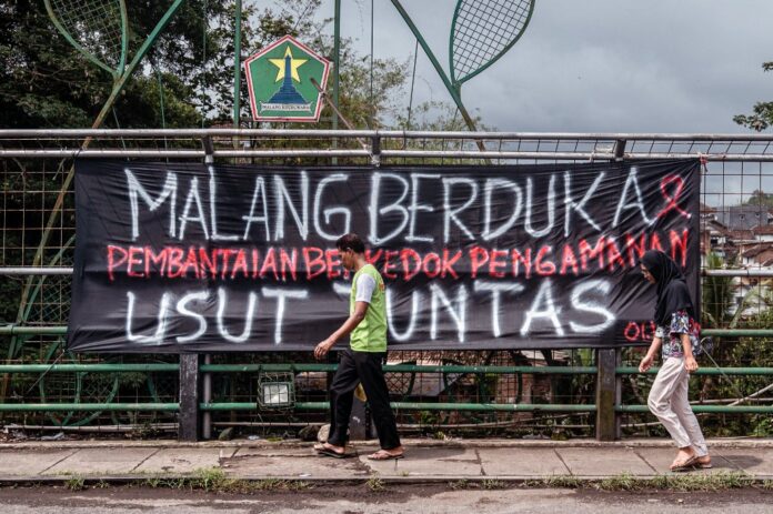 Six charged over Indonesia stadium disaster