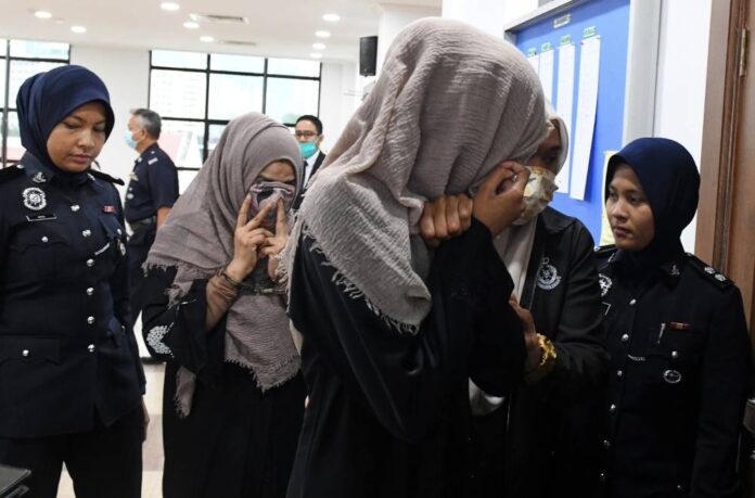 Four, including three in a family, charged with money laundering involving over RM300m in Penang