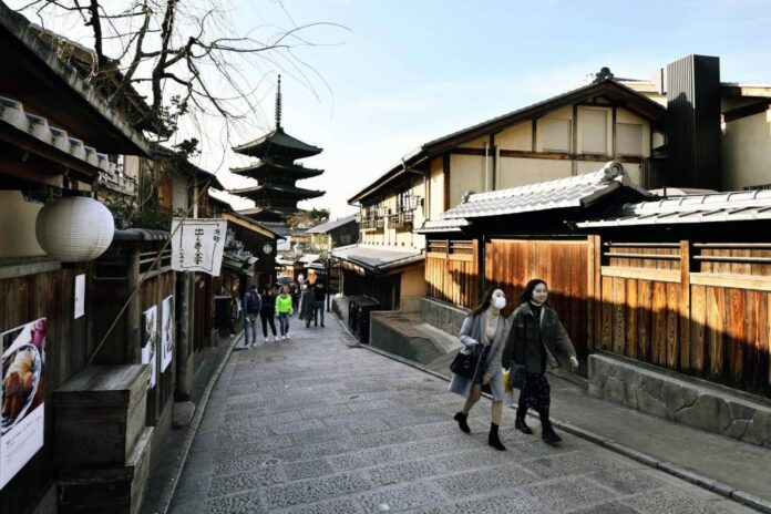 Japan reopens to tourists with shuttered souvenir shops, hotel staff shortage