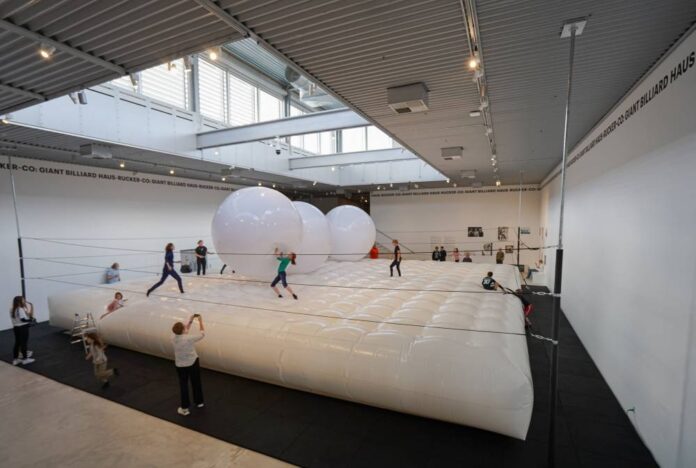 'Human billiards' installation rolls into Danish museum