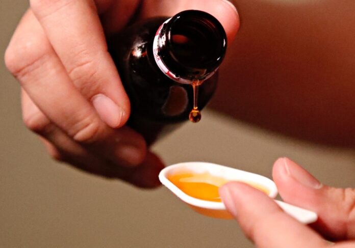 India probes bribery claim in toxic syrup tests