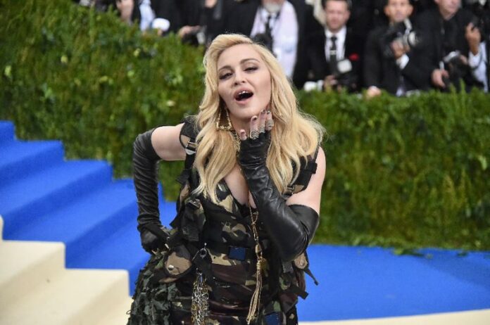 Madonna hospitalised for several days, tour postponed