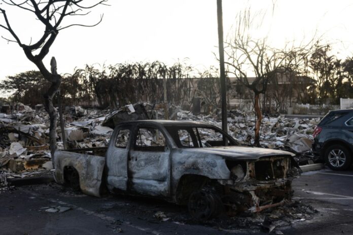 Hawaii fire death toll nears 100, and anger grows