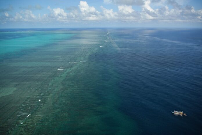 Philippines vows to remove China's future barriers at disputed reef