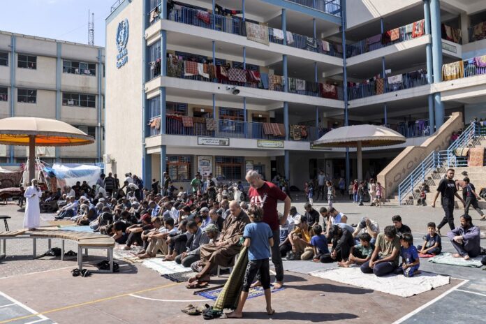 Gazans await ‘life and death’ aid, Israel readies invasion