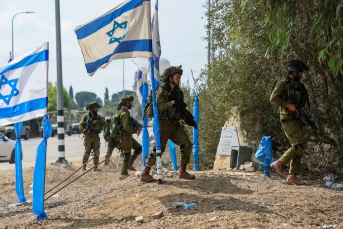 Israel retakes Gaza border area as war's toll mounts