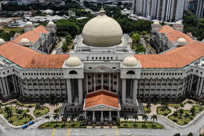 Former Petronas manager pleads not guilty to leaking company report to Petros