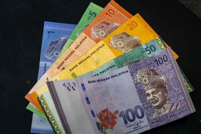 Ringgit gains on weaker US dollar amid fresh US-China frictions